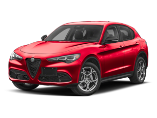 A shiny red Alfa Romeo Stelvio, a luxury compact SUV, is parked looking left.
