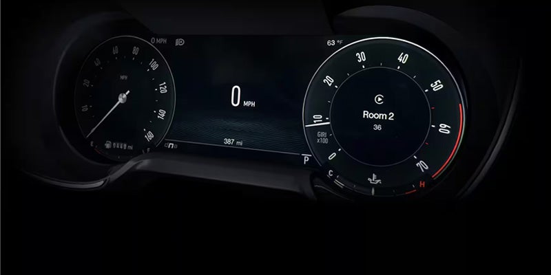 Digital instrument cluster of an Alfa Romeo showing a digital speedometer.